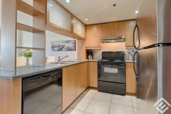Fully Furnished Condo kitchen in Montreal fully furnished apartments in montreal