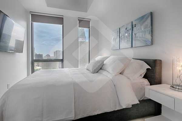 sideview of bedroom in short term furnished apartment rental in montreal short term furnished apartment rental in montreal